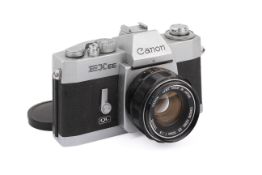 A Canon EX EE 35mm SLR Camera. With a Canon 50mm f1.8 lens. Shutter working.