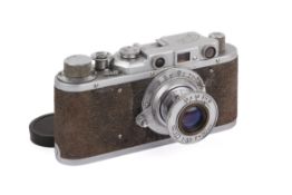 A FED 1g 35mm Rangefinder Camera. Chrome. 1954. Serial number 568708. With a FED 50mm f3.5 lens.
