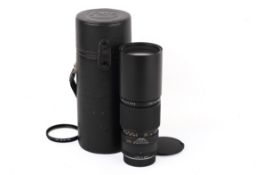 A Leitz 250mm f4 Telyt-R lens. Serial number 3108681. Leica R mount. With caps and makers case.