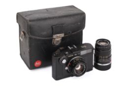 A Leica CL 35mm Rangefinder Camera Outfit, Black. 1975. Serial number 1317492.