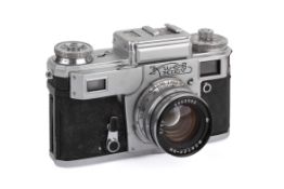 A Kiev 4 35mm Rangefinder Camera. Chrome. Serial number B 7406199.