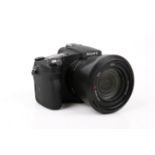 A Sony RX10 iv digital bridge camera. S/n 4496071, with a Zeiss Vario-Sonnar T* 2.4-4/8.