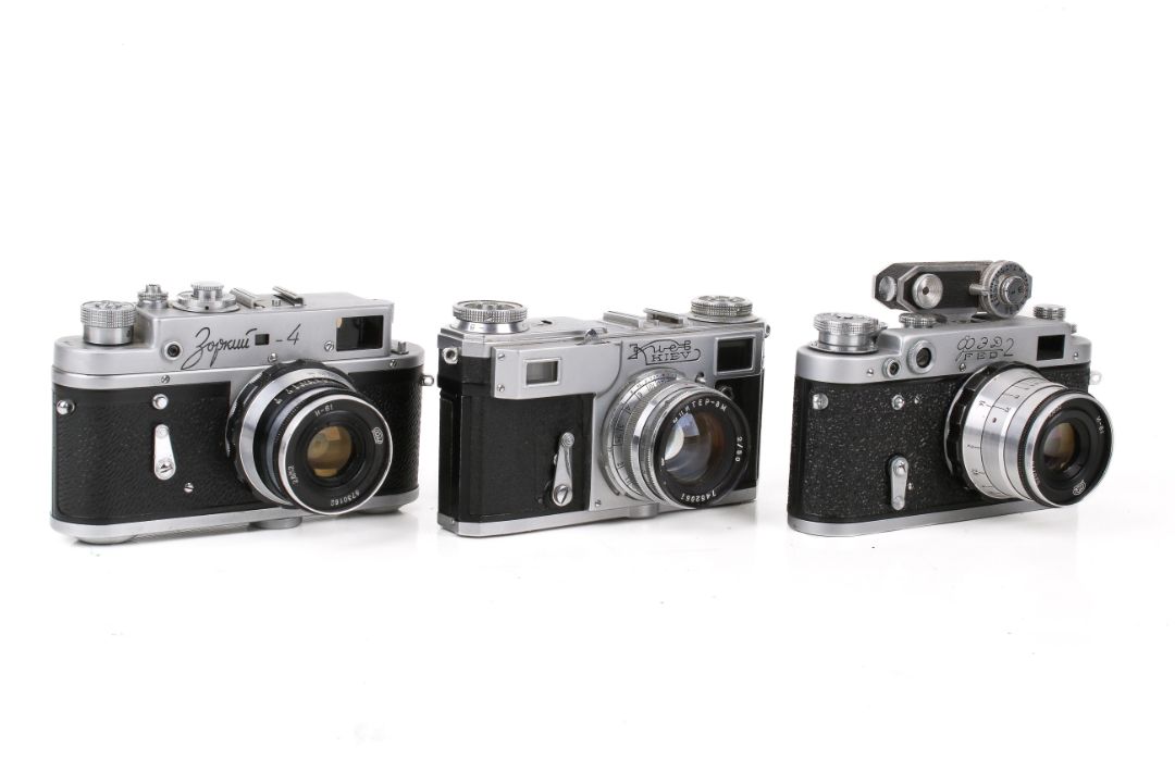 A group of three assorted Soviet rangefinder film cameras. - Image 1 of 5