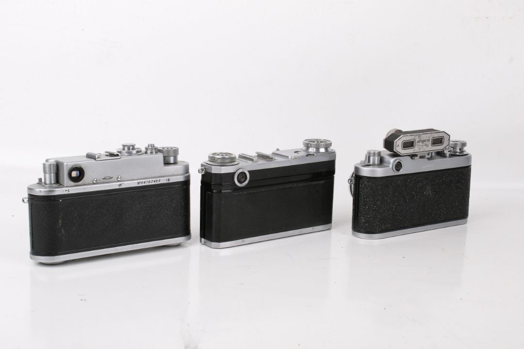 A group of three assorted Soviet rangefinder film cameras. - Image 2 of 5