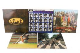The Beatles - four assorted LP vinyl records and a Ravi Shankar. Consisting of Sgt.