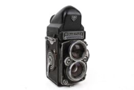 A vintage Rolleiflex TLR medium format 2.8 model film camera.