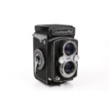 A vintage Yashica-Mat TLR medium format film cameras.