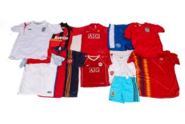 A collection of nine assorted football retro shirts.
