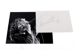 Roger Daltrey (The Who), autograph and a black and white photograph.