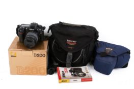 A Nikon D200 digital camera outfit. S/n 8011676, with Sigma Zoom 18-125mm 1:3.5-5.6 DC lens, etc.
