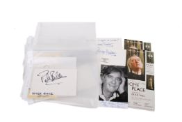 A collection of assorted autographs - musicians, actors and entertainers with some related ephemera.