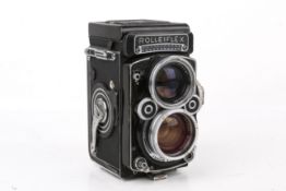 A vintage Rolleiflex TLR medium format 2.8 model film camera.