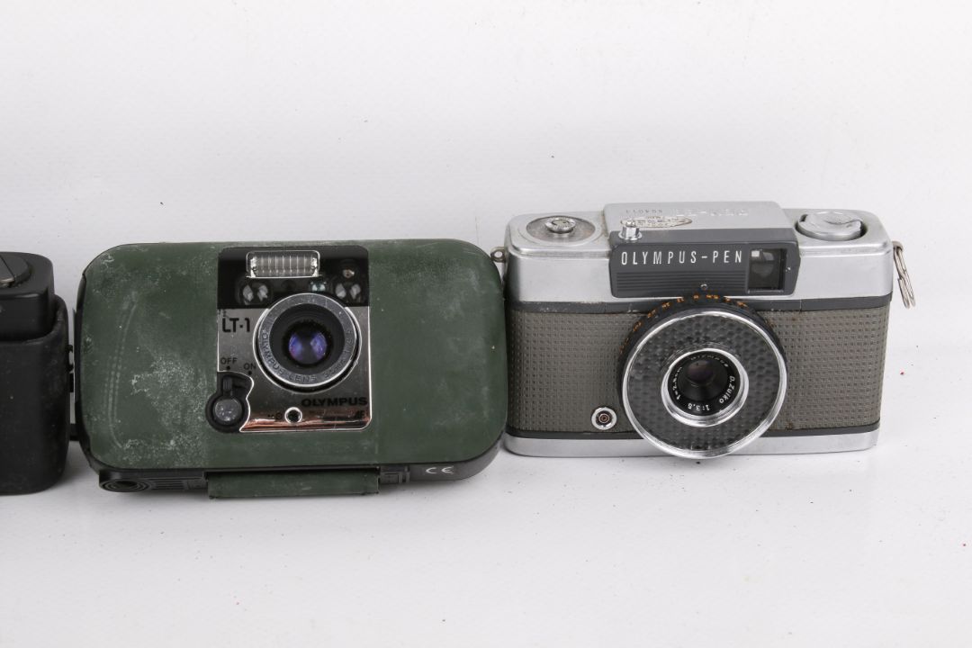 A group of four assorted compact 35mm film cameras. - Image 2 of 3