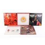 A group of five assorted late 1960 early 70s rock vinyl LP record albums.