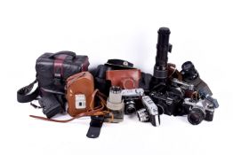 Box of assorted film cameras and accessories. Including cine film cameras, etc.