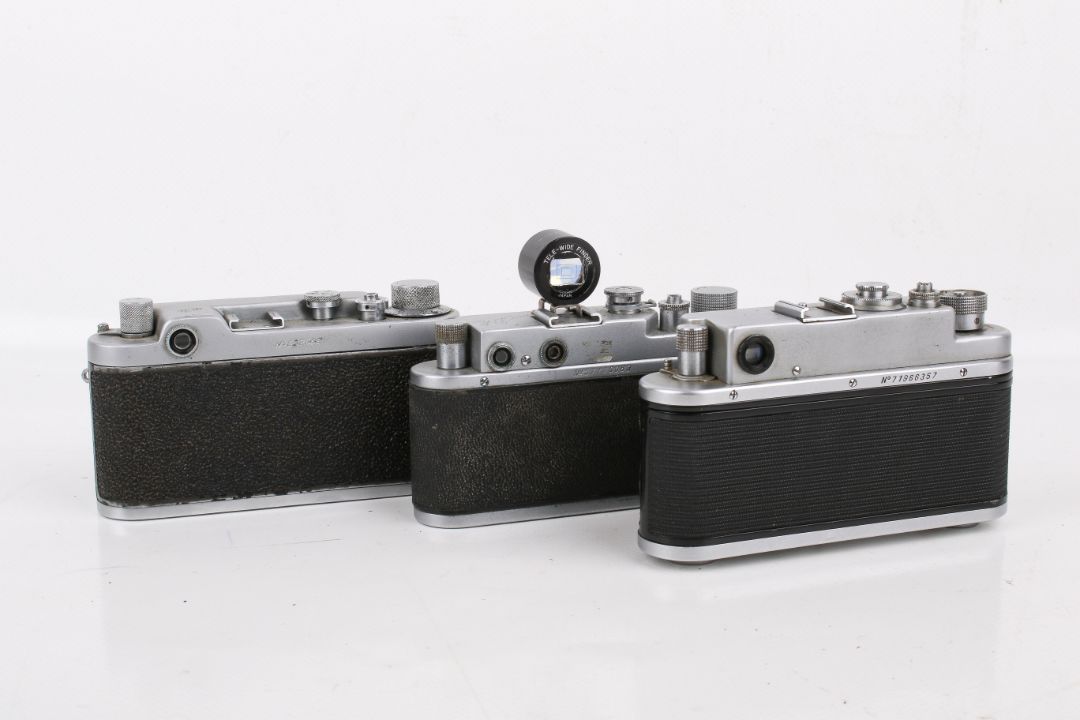 A group of three assorted Soviet rangefinder film cameras. - Image 2 of 2
