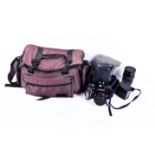 Minolta 7000AF 35mm film camera with 50mm lens, 35-105mm lens,