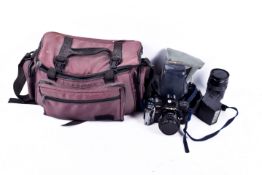 Minolta 7000AF 35mm film camera with 50mm lens, 35-105mm lens,