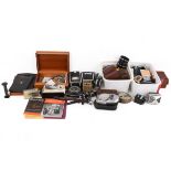 A collection of assorted vintage camera accessories.