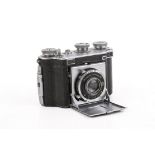A vintage Dollina Certo Dresden folding rangefinder 35mm film camera.
