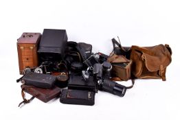 Box of assorted film cameras and accessories. Including a mahogany cased, folding, etc.