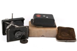 A circa 1920 Plaubel Makina II strutfolding bellows film cameras.