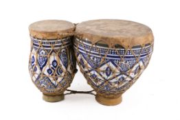 A pair of traditional Moroccan Tbilat double ceramic hand drums.
