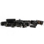 A collection of ten assorted vintage folding bellows film cameras.