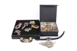 A small box of costume jewellery.