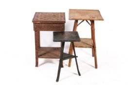 A group of three assorted occasional tables.