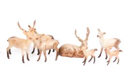 A collection of Beswick porcelain deer and stags.