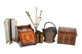 A collection of assorted fire side items.