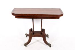 An early 20th century drop leaf mahogany tea table.