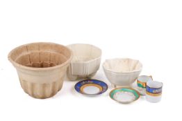 A group of three assorted 19th Century pottery jelly moulds.