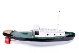 A remote control boat based on a converted lifeboat. Having a fibreglass hull, with batteries.