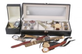 A collection of assorted costume watches and a display box.