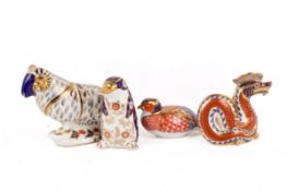 Four Royal Crown Derby animals. Comprising a dragon, penguin, pheasant and a ram, Max.