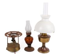 Three Victorian and later oil lamps.
