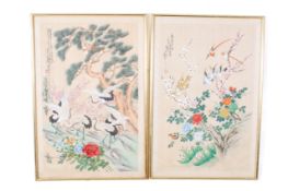 A pair of traditional Chinese silk paintings, depicting birds amongst foliage.