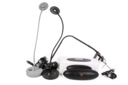 Three contemporary LED task lamps and a 'Great Pulse ML' portable bluetooth speaker.