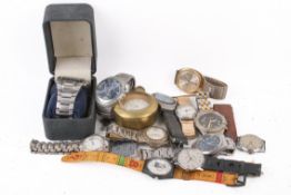 A group of assorted vintage and modern watches.