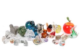 A large collection of contemporary paperweights.