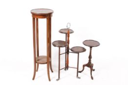 Three items of dark wood furniture.