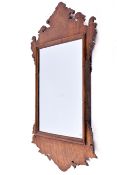 A George III design mahogany fretwork wall mirror.