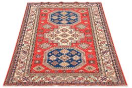 A Persian style rug.