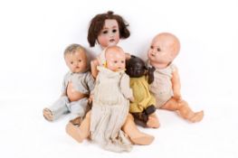 Five vintage dolls.