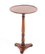 A Victorian style mahogany wine table.