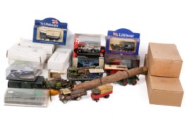A collection of playworn diecast cars, mostly agricultural vehicles.