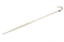 A Nailsea type clear glass walking cane.