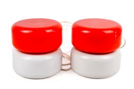 A pair of 1970s period Thorn lighting cylindrical bedside lamps.